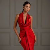 Elegant red evening dress with draped halter neckline and ruched waist, luxury fashion photography