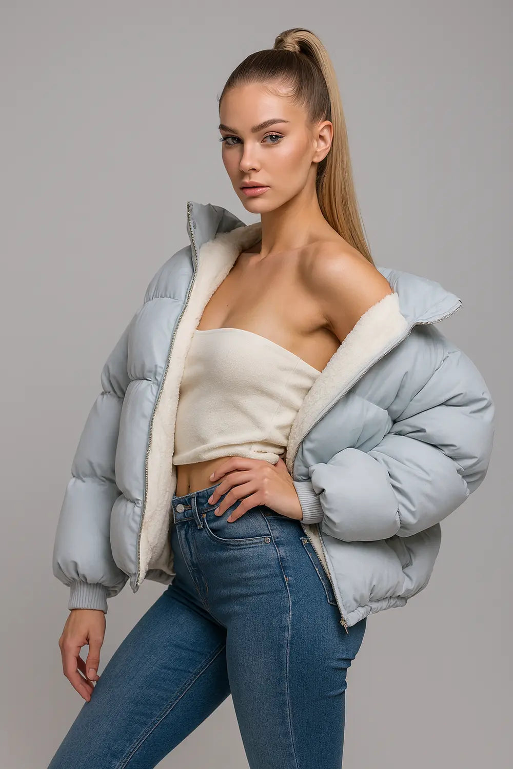Women's light blue cropped puffer jacket with faux shearling lining