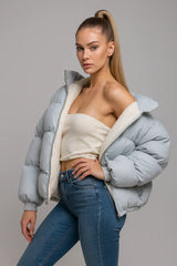 Women's light blue cropped puffer jacket with faux shearling lining