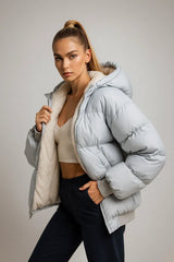 White lamb fleece lined puffer jacket with hood modeled in casual winter outfit